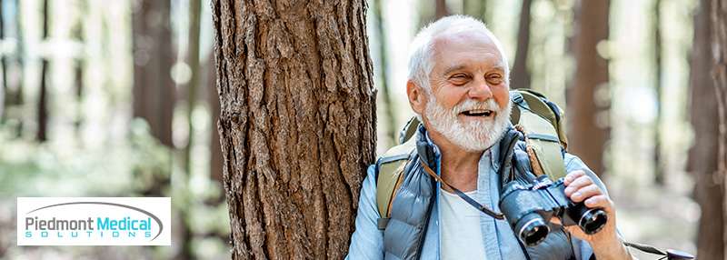 Elder gentlemen outside hiking in the wilderness