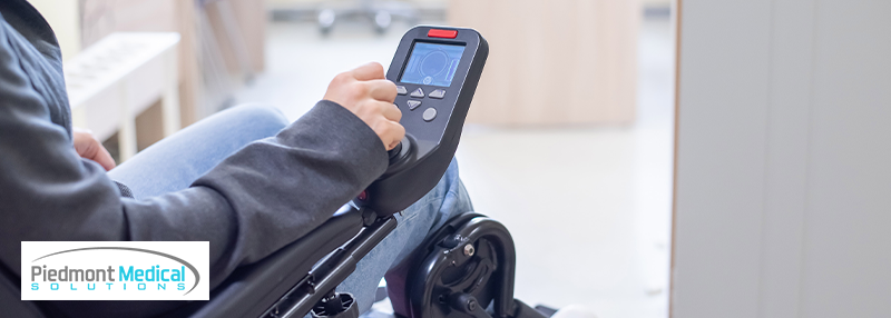 Power chair user controlling the joystick