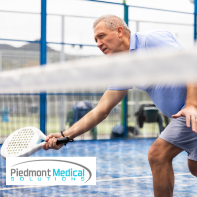 Man playing pickleball on the court